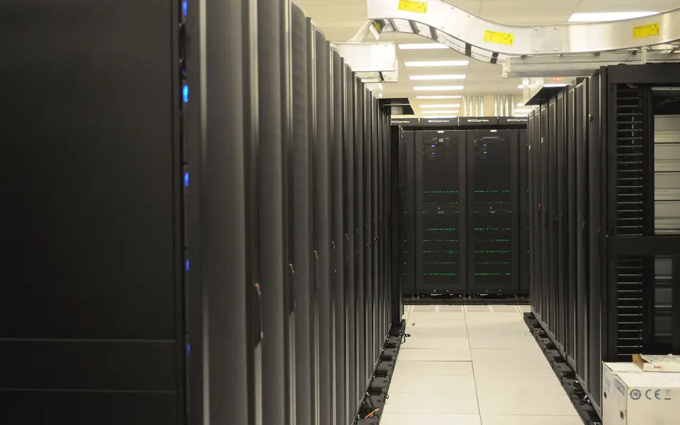 Rows of network and server cabinets in a data centre