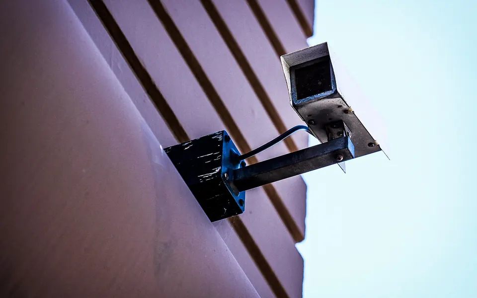 Security camera mounted on the exterior of a building